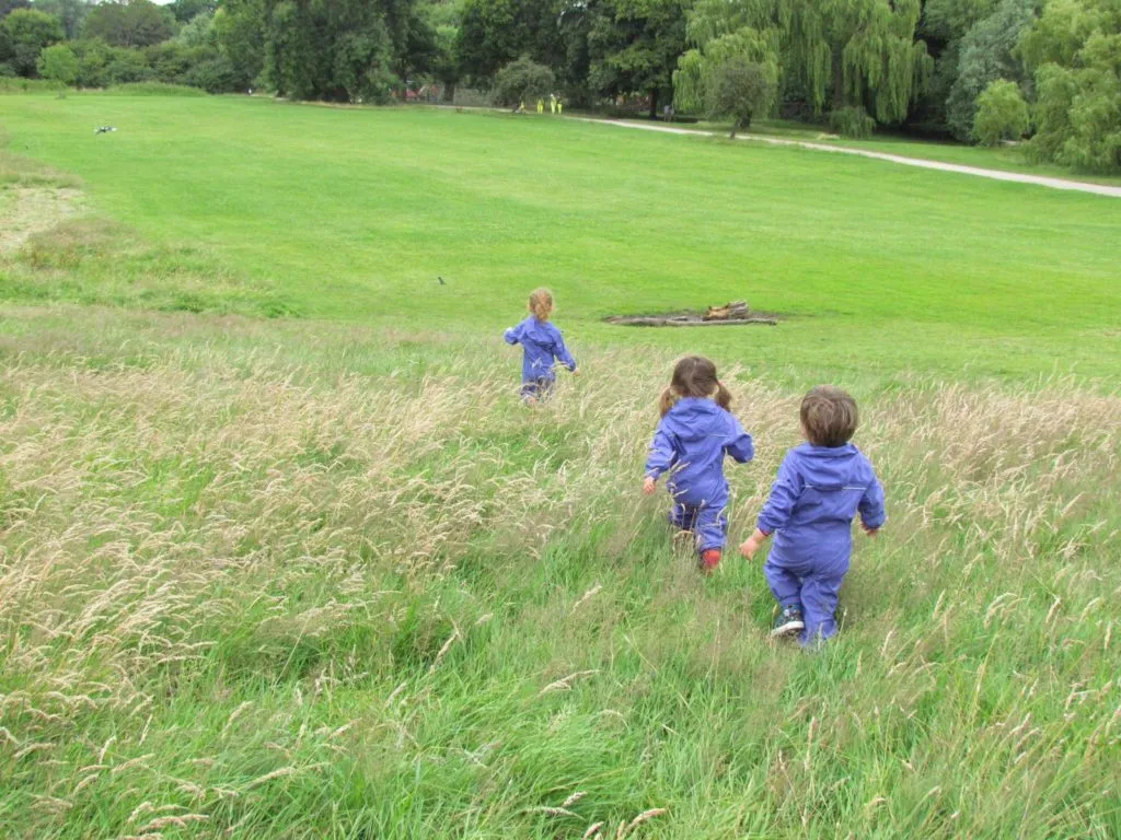 children running on a field