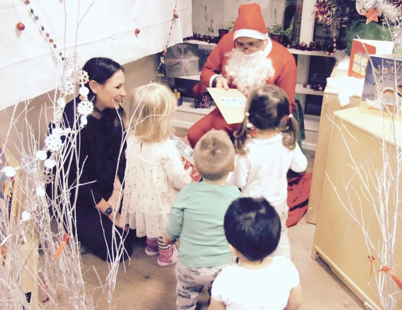 santa giving gifts to all the goodest kids